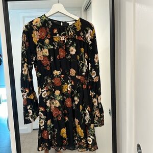 HM black mini dress with printed flower design